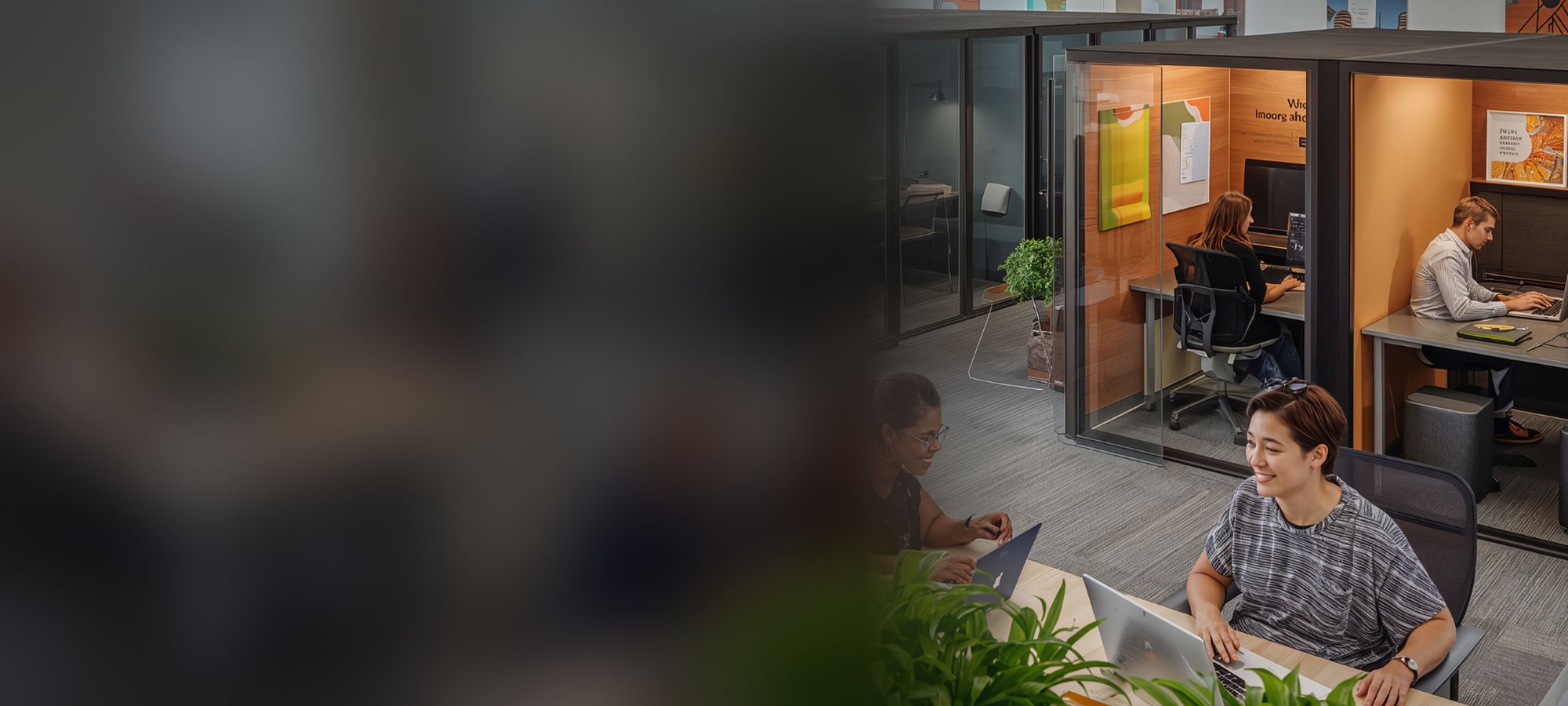 Emerge team members working together in a bright open-plan office